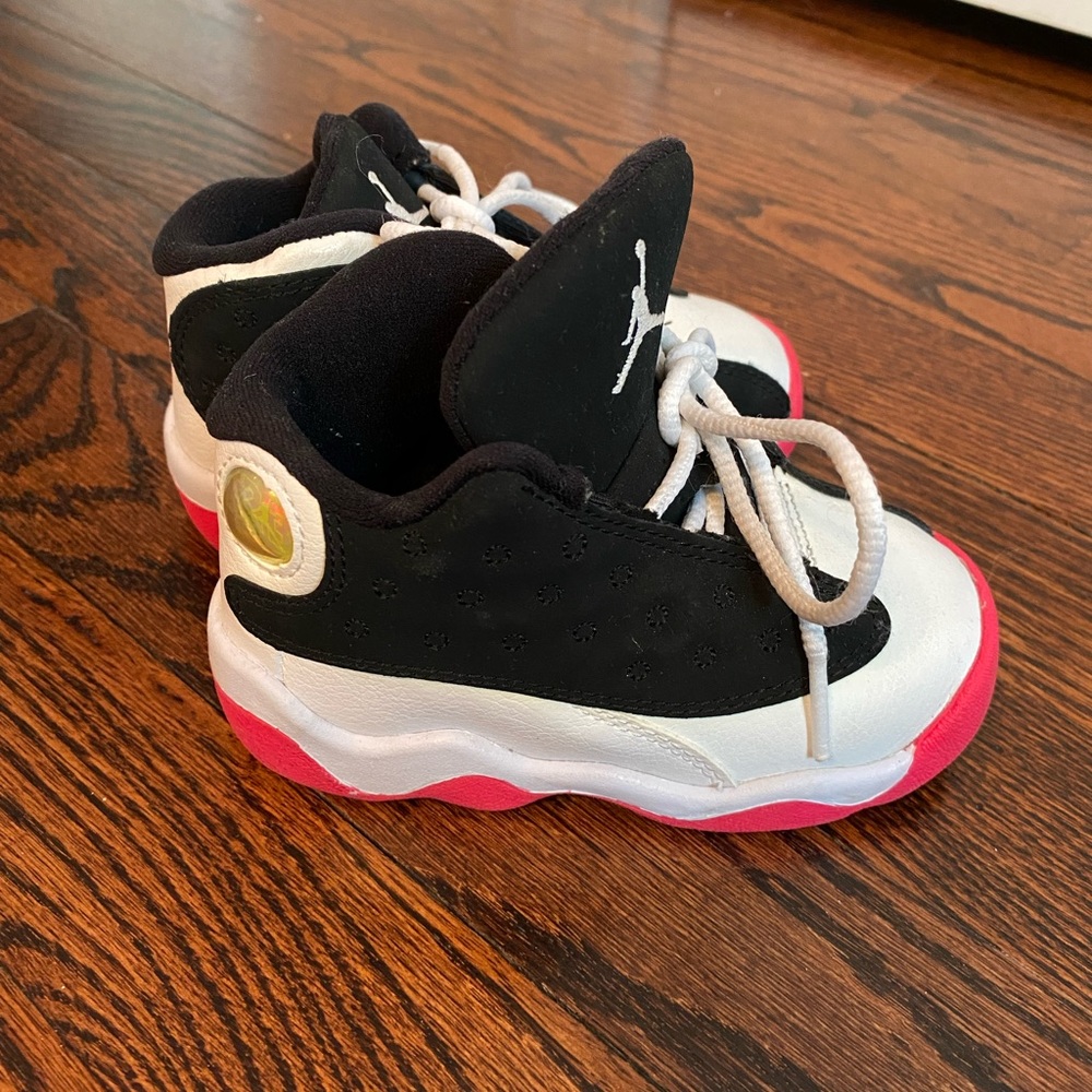Authentic Toddler girls size 6 Jordan’s black and white with hot pink accents.